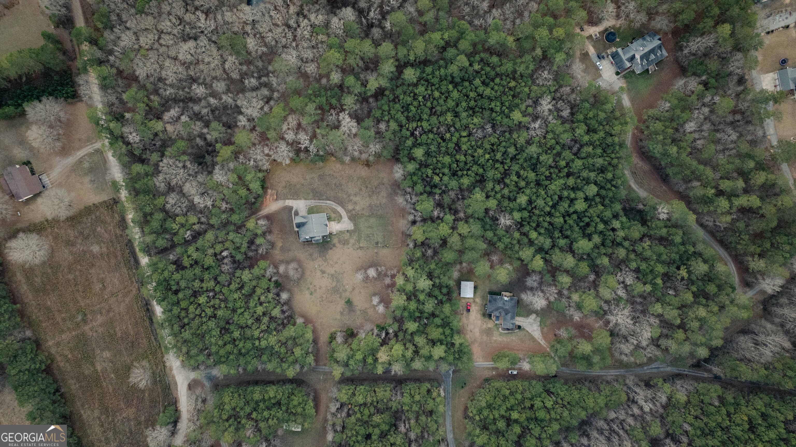 123 Rabbit Run Drive Meansville, GA 30256 - Photo 85 of 101 an aerial view of a residential houses with outdoor space and trees