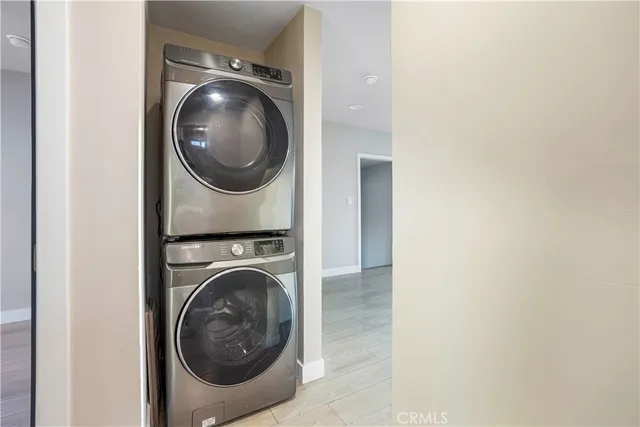 a view of a utility room with dryer and washer