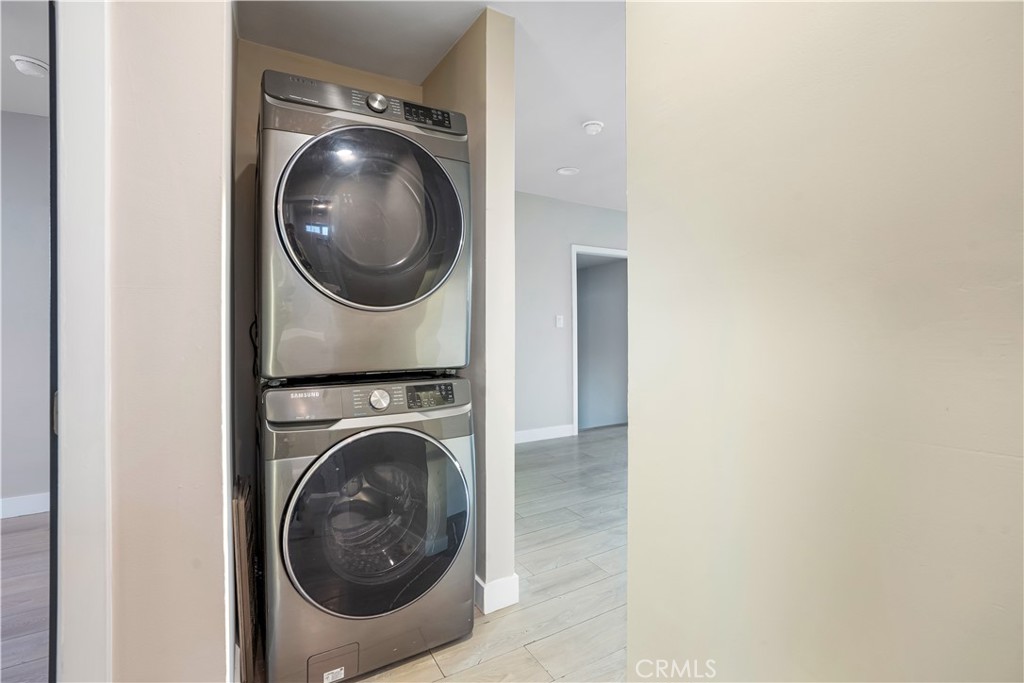 8466 Quartz Avenue Winnetka, CA 91306 - Photo 7 of 16 a view of a utility room with dryer and washer