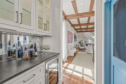 a view of a living room and dining room