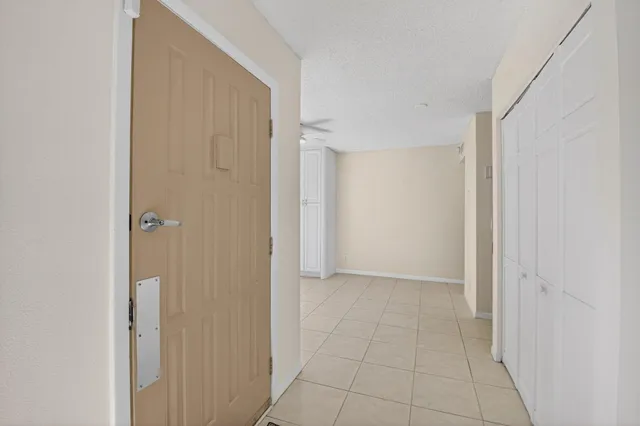 a view of a park that has a sign board