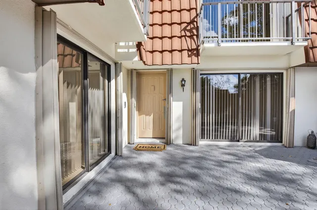a view of a house with a small porch
