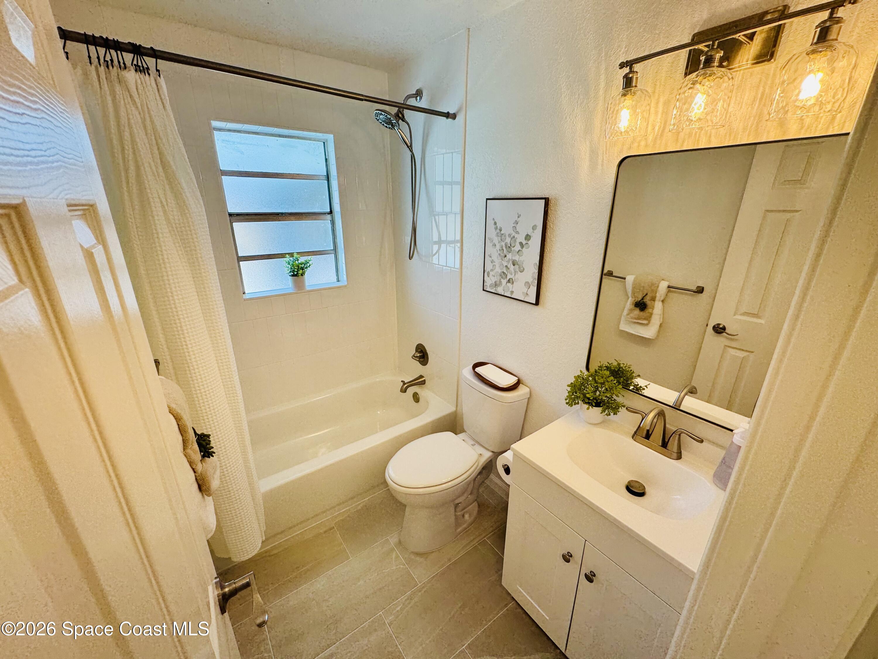 1910 Tallridge Road Melbourne, FL 32935 - Photo 18 of 34 hall bath