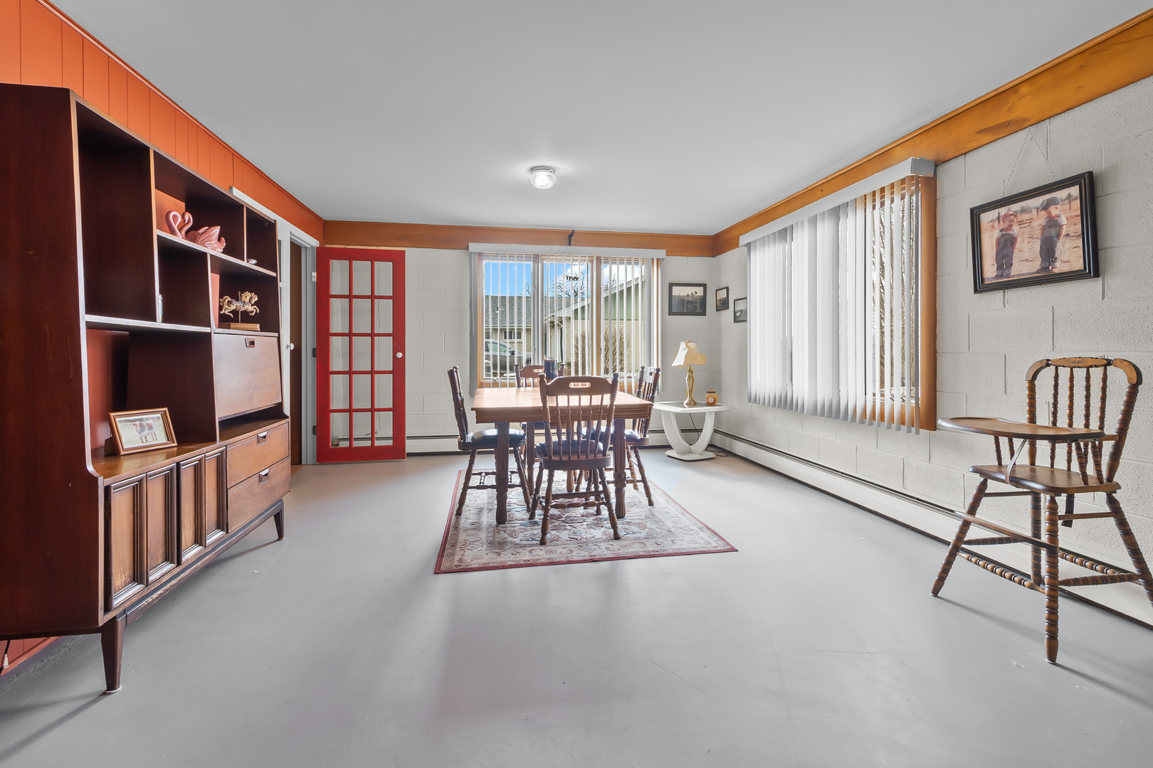 1306 Garfield Road Harvard, IL 60033 - Photo 23 of 38 a dining room with furniture and a floor to ceiling window