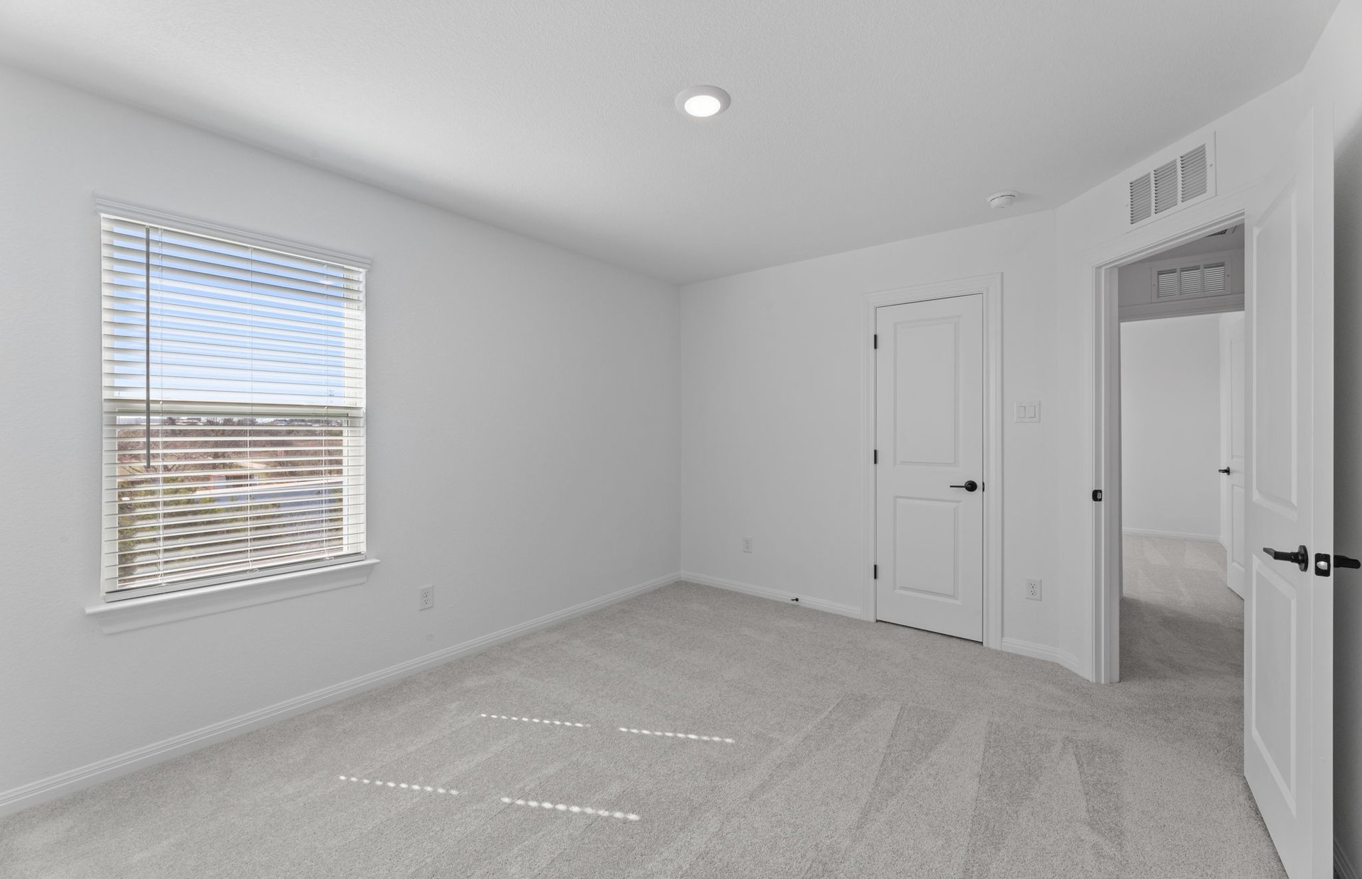 528 Knot Drive Leander, TX 78641 - Photo 19 of 29 a view of an empty room with a window