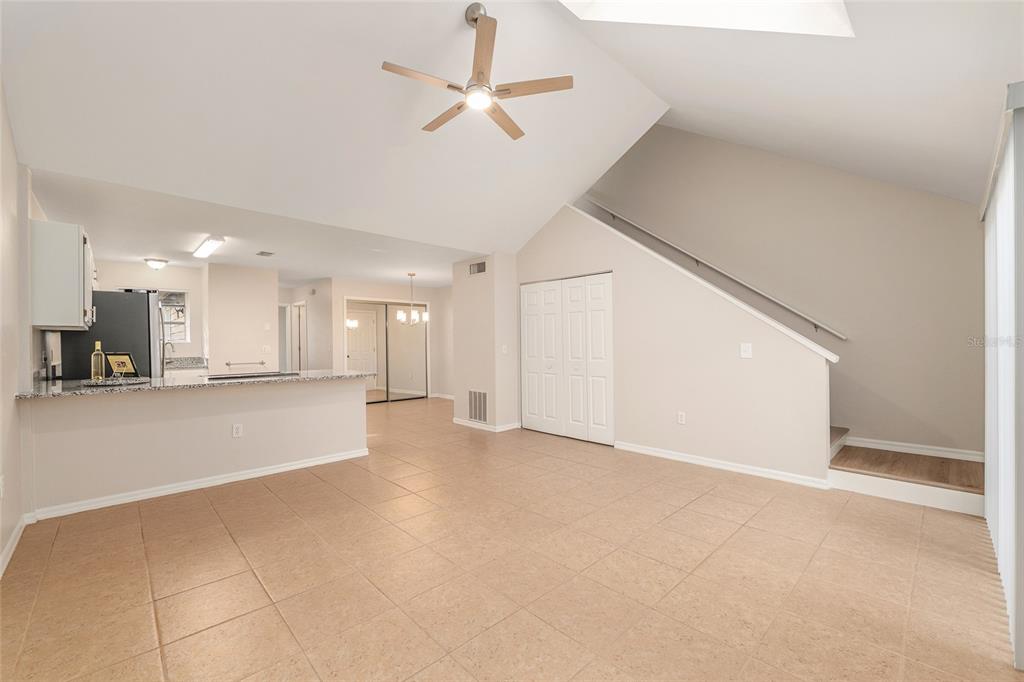 9755 Southwest 52nd Road Gainesville, FL 32608 - Photo 22 of 43 a view of an empty room with a kitchen