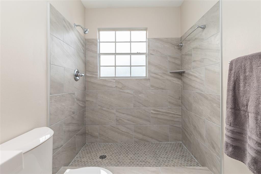 9755 Southwest 52nd Road Gainesville, FL 32608 - Photo 30 of 43 a bathroom with a shower