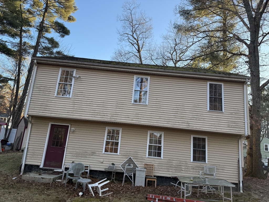6 Rumford Road Norton, MA 02766 - Photo 2 of 10 a front view of a house with a tree