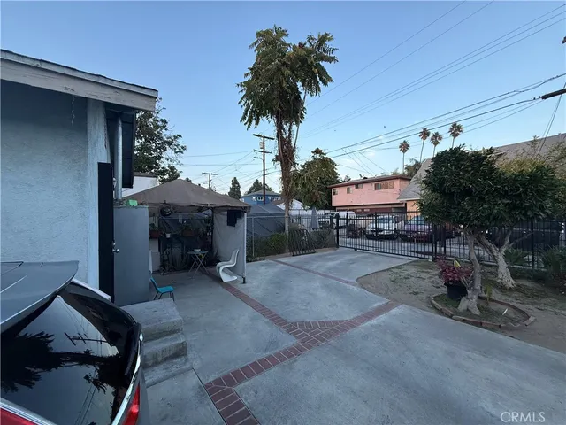a view of a house with a yard and garage