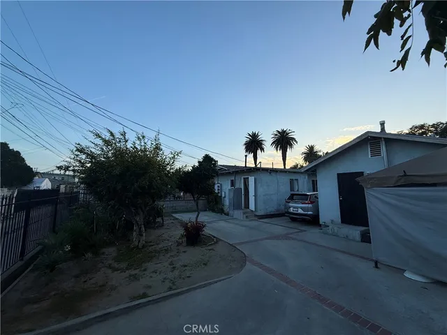 a car parked in front of a house