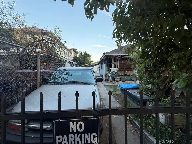 a aerial view of a house with a yard