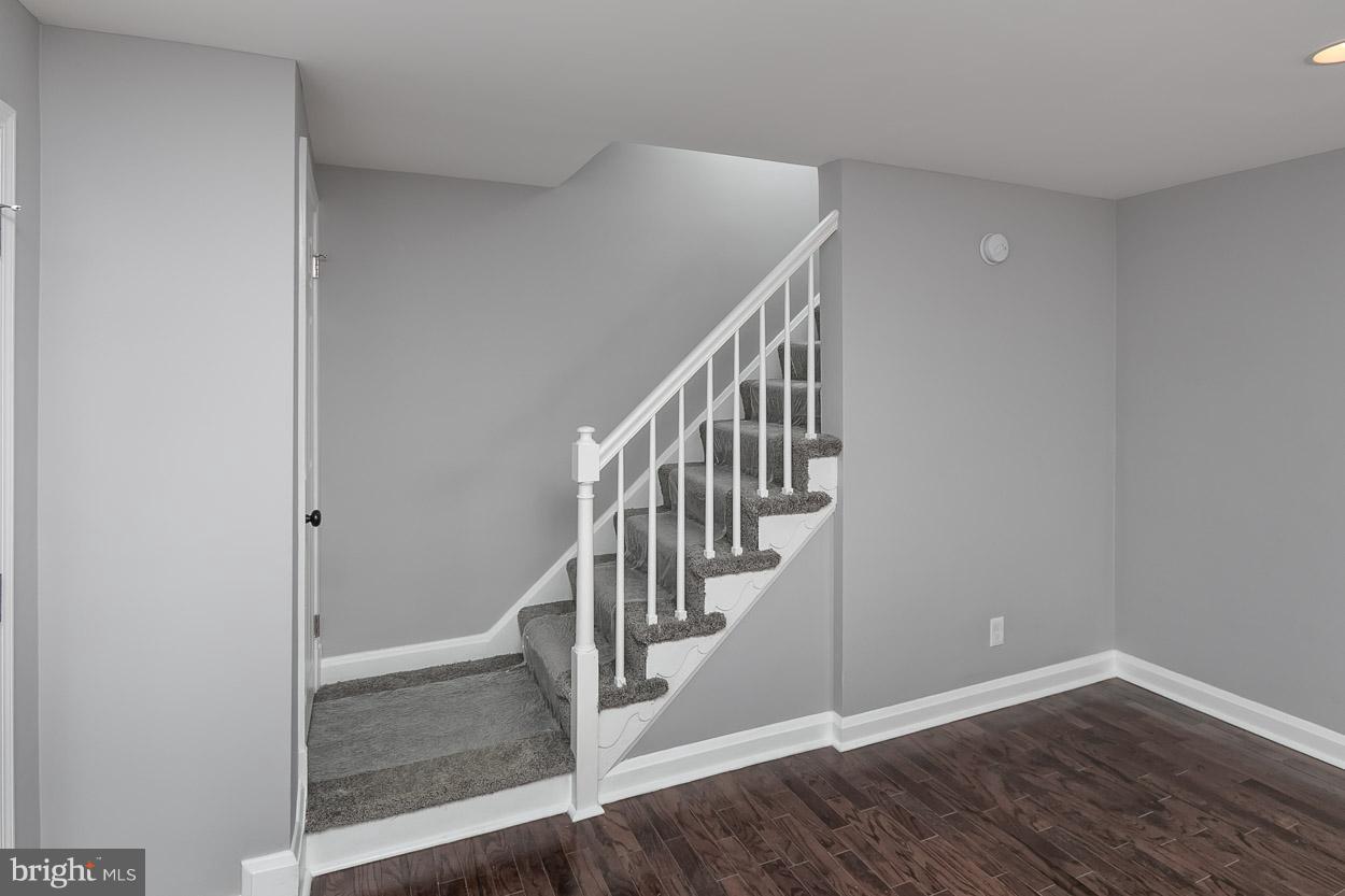 1901 Crestview Road Baltimore, MD 21239 - Photo 13 of 30 a view of entryway and hall with wooden floor