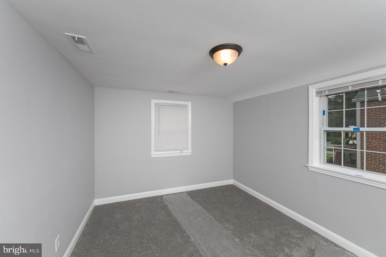 1901 Crestview Road Baltimore, MD 21239 - Photo 18 of 30 an empty room with a window