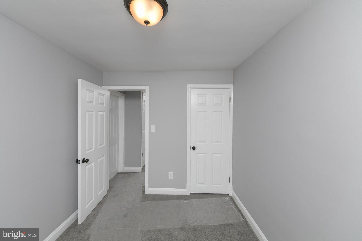 1901 Crestview Road Baltimore, MD 21239 - Photo 21 of 30 a view of a livingroom with wooden floor
