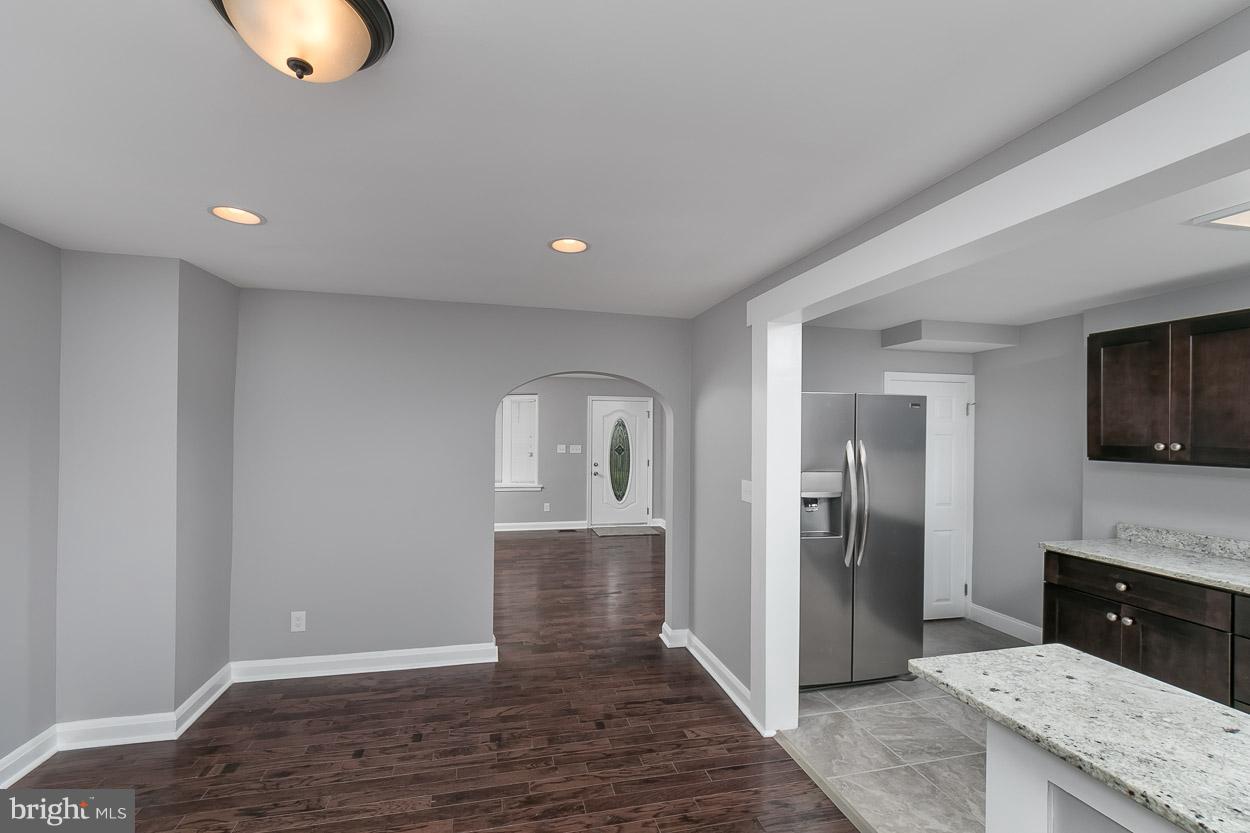 1901 Crestview Road Baltimore, MD 21239 - Photo 8 of 30 a view of entryway with kitchen and sink