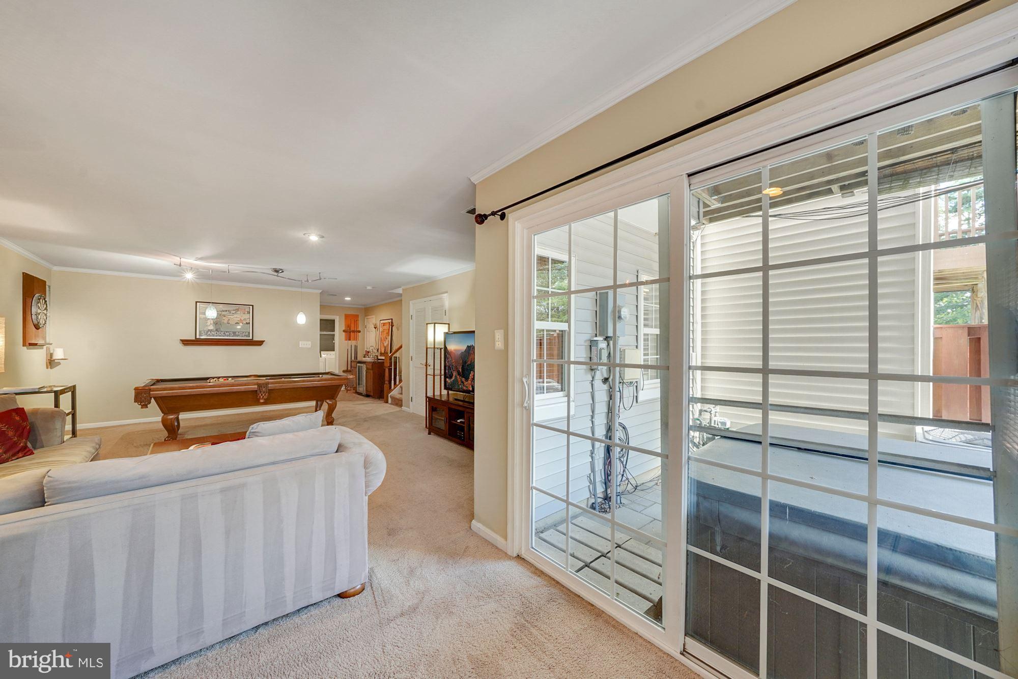 7327 Oldham Leeds Way Springfield, VA 22150 - Photo 39 of 50 Rec Room leads to patio with hot tub!