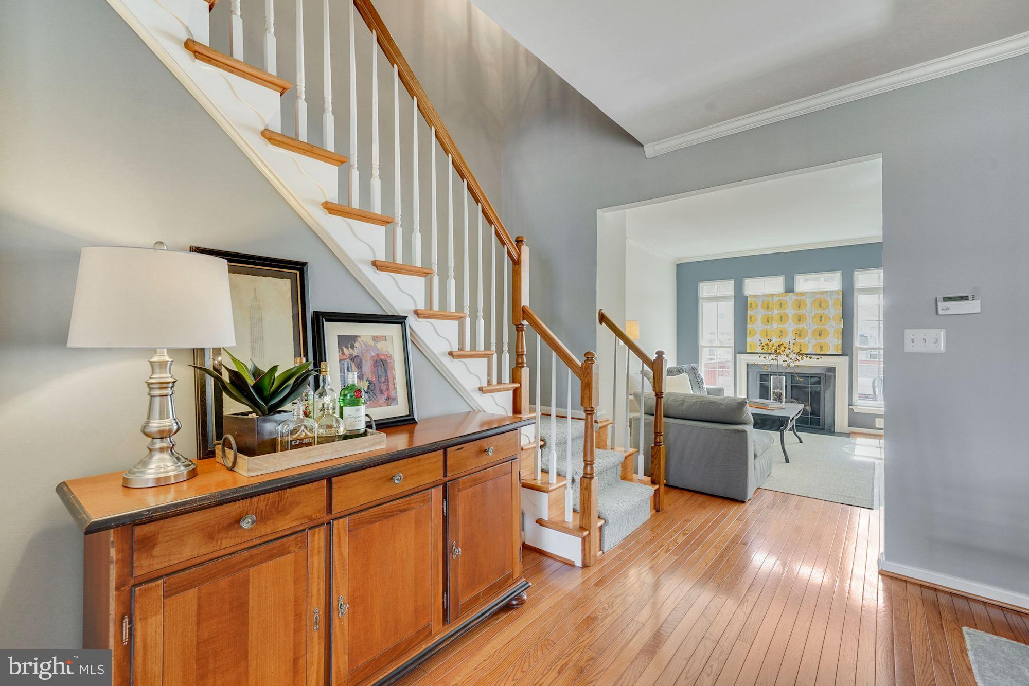 7327 Oldham Leeds Way Springfield, VA 22150 - Photo 8 of 50 Living/Dining Rooms lead to Kitchen/Family Room