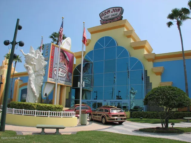 a view of a car park in front of a building