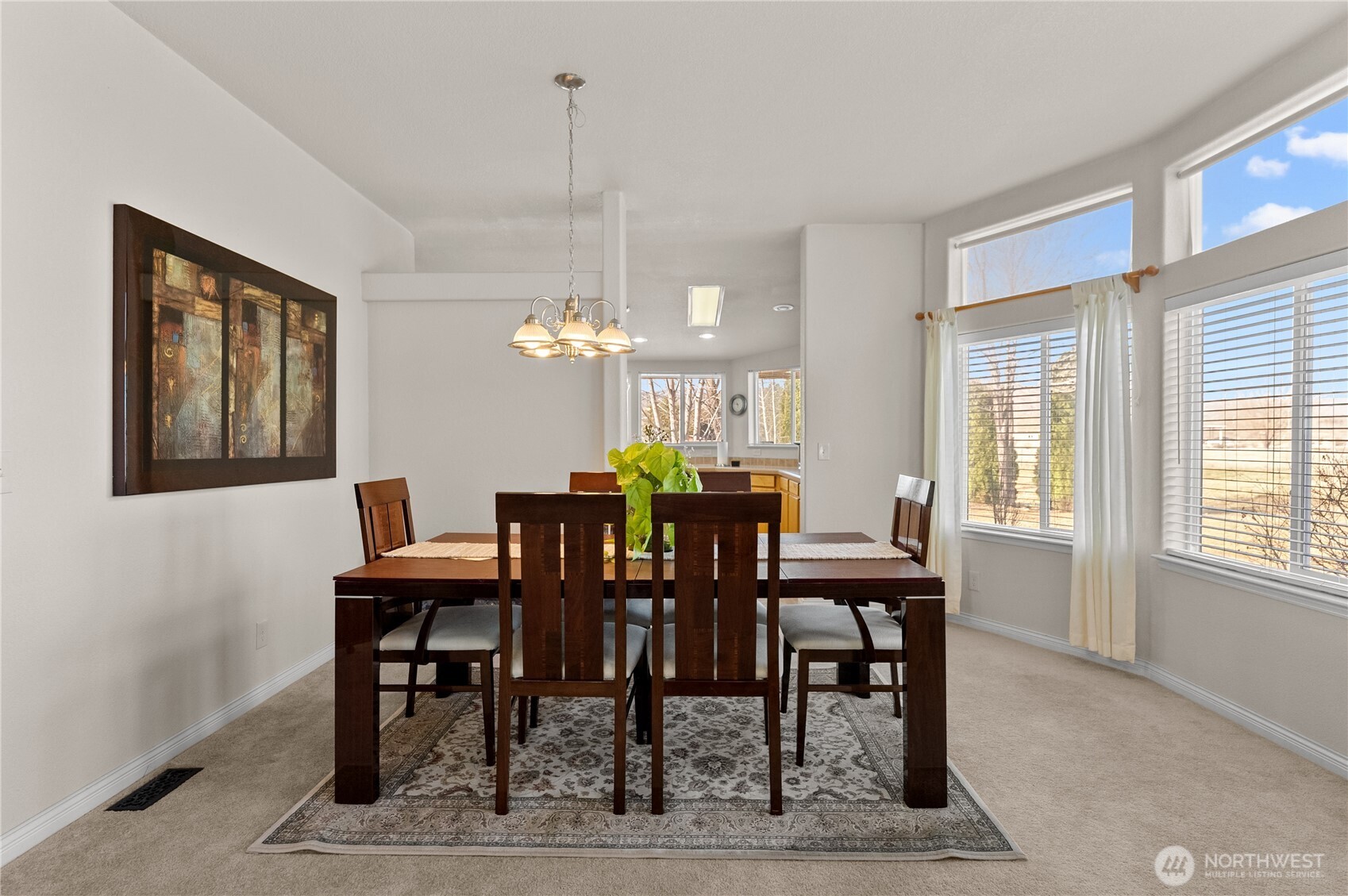 95 Woods Road Omak, WA 98841 - Photo 16 of 40 a view of a dining room with furniture