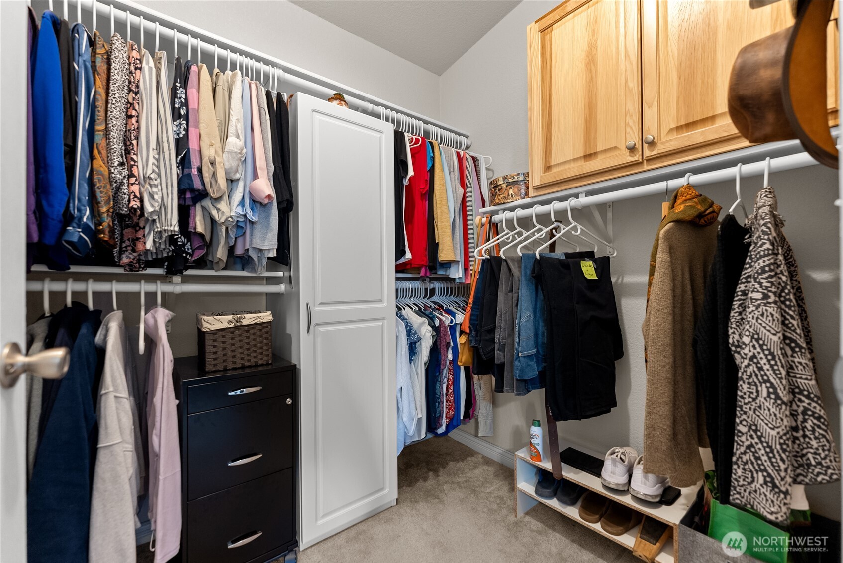 95 Woods Road Omak, WA 98841 - Photo 31 of 40 a view of walk in closet with clothes