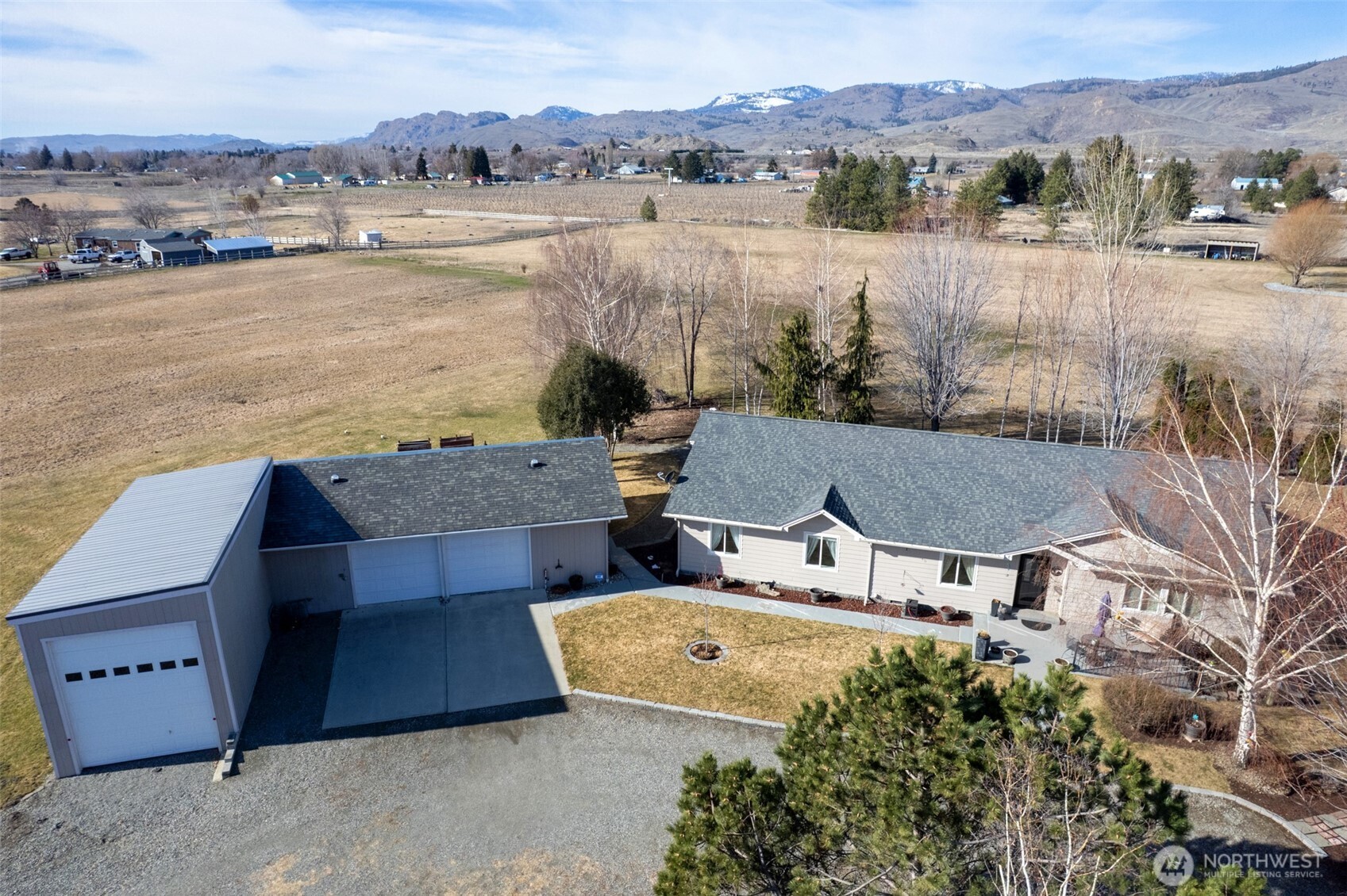 95 Woods Road Omak, WA 98841 - Photo 5 of 40 an aerial view of a house with a lake view