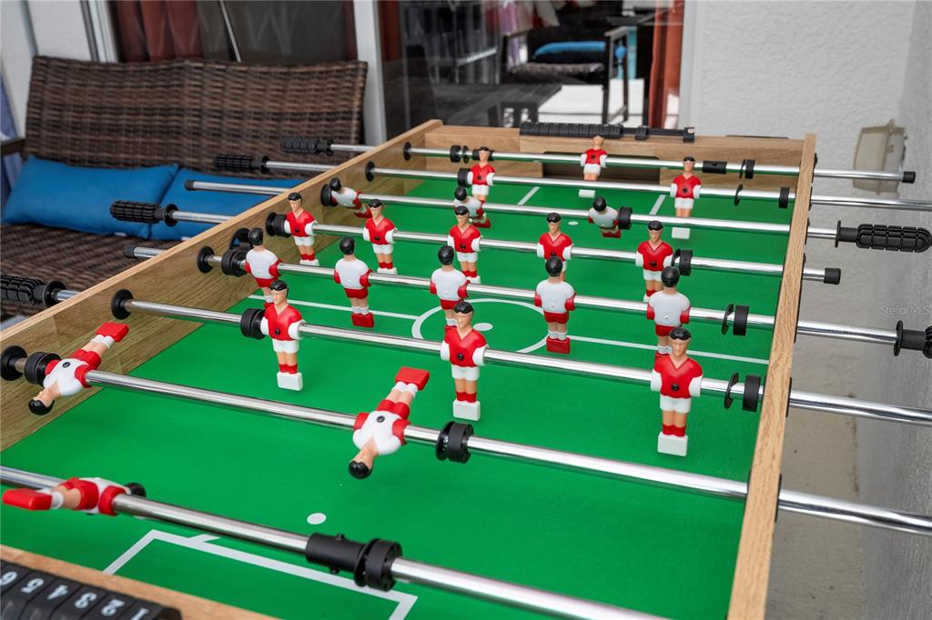 4978 Strand Street Kissimmee, FL 34758 - Photo 19 of 30 a green field with lots of flowers on it