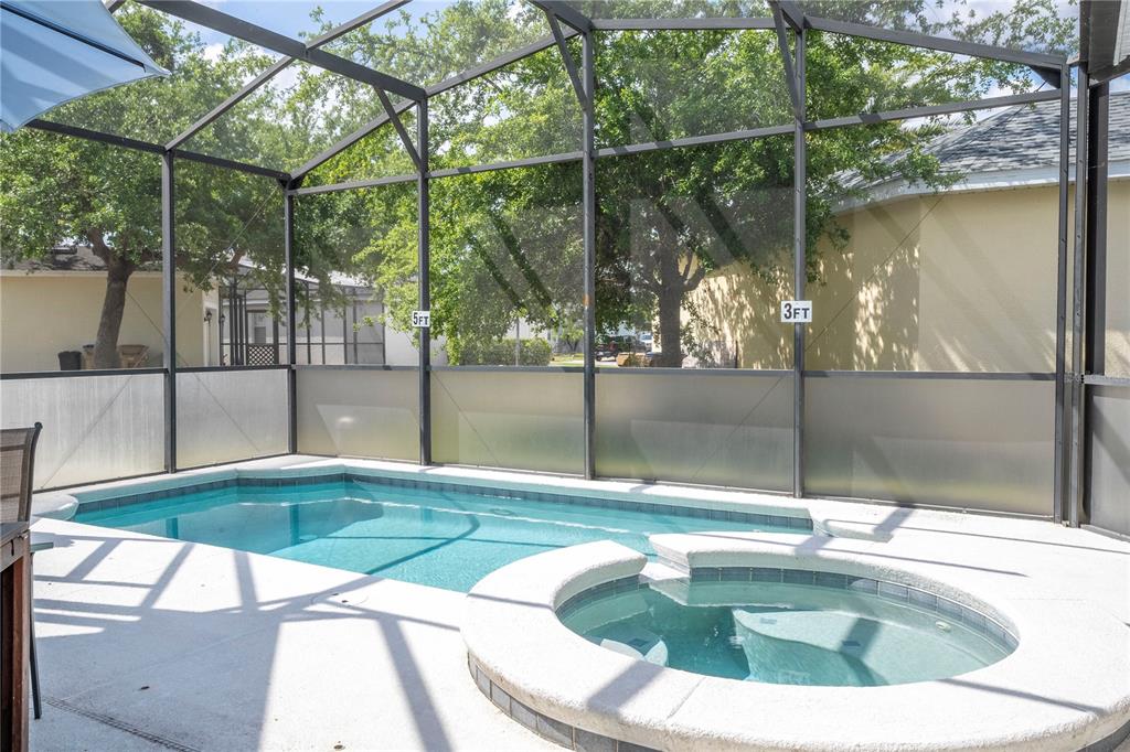 4978 Strand Street Kissimmee, FL 34758 - Photo 23 of 30 a view of outdoor space with swimming pool