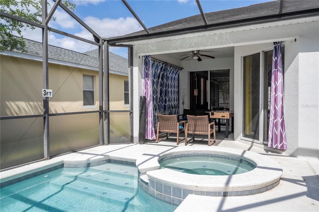 4978 Strand Street Kissimmee, FL 34758 - Photo 24 of 30 a room with table and chairs