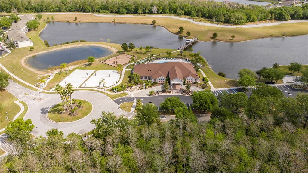 4978 Strand Street Kissimmee, FL 34758 - Photo 27 of 30 an aerial view of a house with backyard outdoor seating and lake view