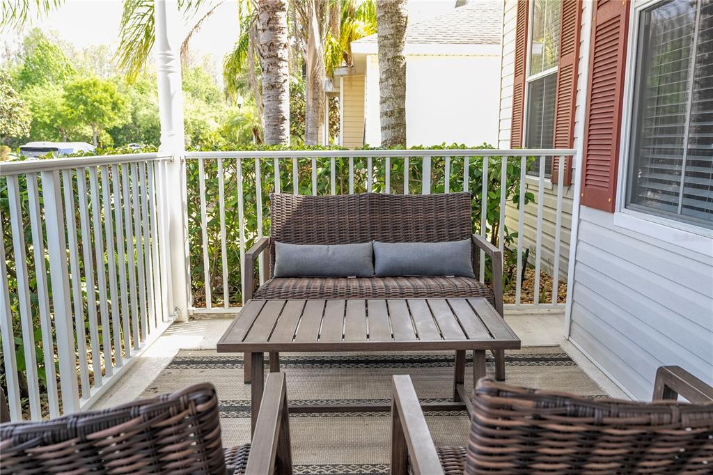 4978 Strand Street Kissimmee, FL 34758 - Photo 4 of 30 a view of a chairs on the roof deck