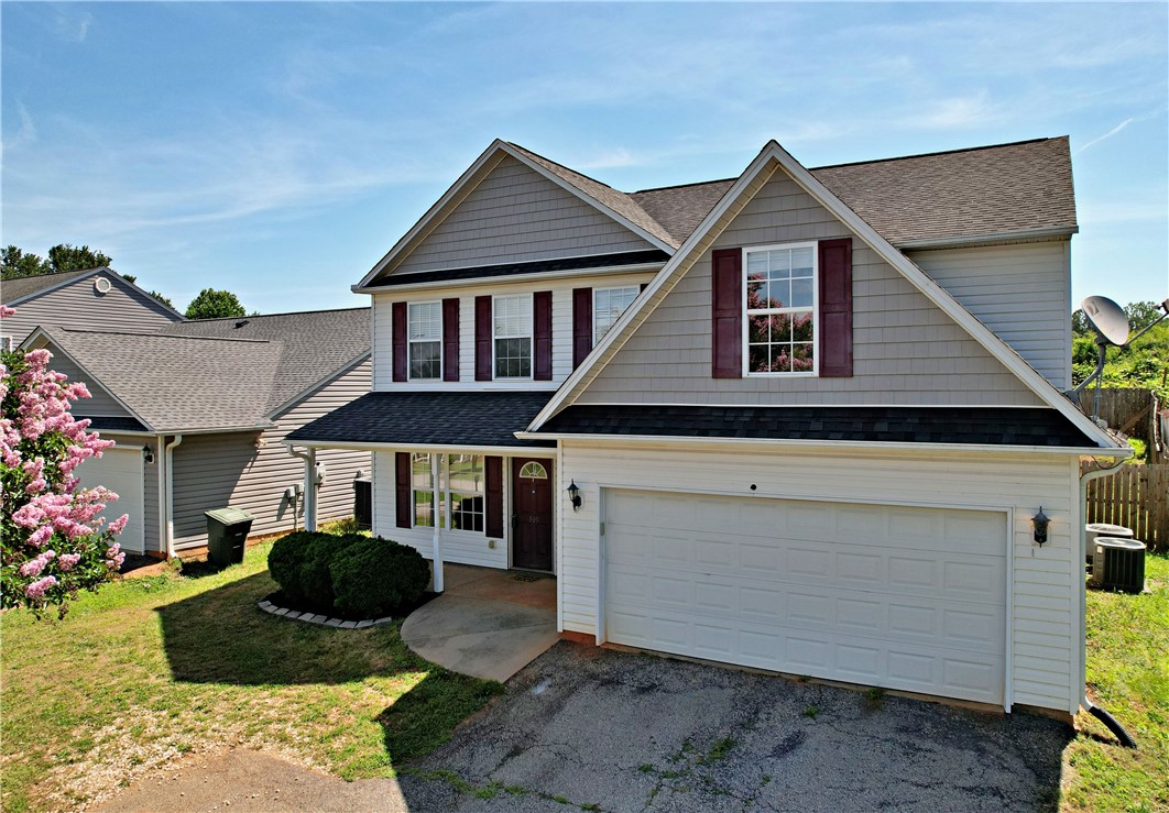 305 North Chestnut Street Seneca, SC 29678 - Photo 1 of 44 A classic facade with shuttered windows and an attached garage welcomes you home.