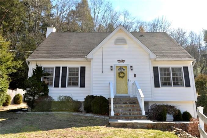 58 Glen Road Newtown, CT 06482 - Photo 1 of 1 a front view of a house with garden