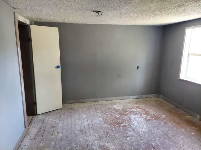 an empty room with windows