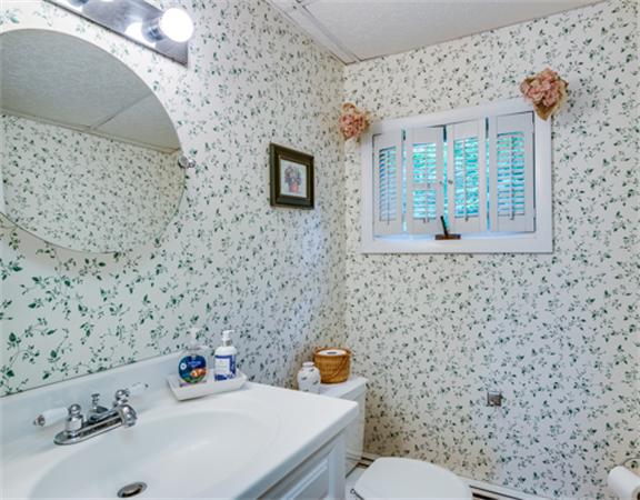 96 Columbia Road Arlington, MA 02474 - Photo 13 of 21 a bathroom with a sink and a toilet