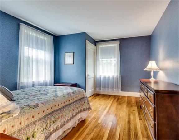 96 Columbia Road Arlington, MA 02474 - Photo 15 of 21 a bedroom with a bed and a window
