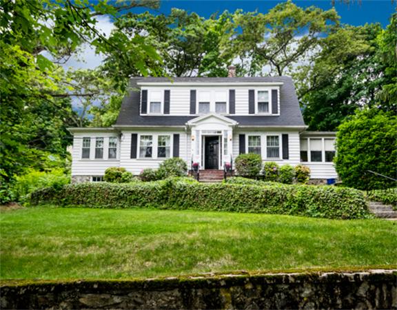 96 Columbia Road Arlington, MA 02474 - Photo 2 of 21 a front view of a house with a yard