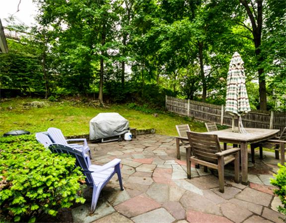 96 Columbia Road Arlington, MA 02474 - Photo 21 of 21 a view of a backyard with chairs and a table