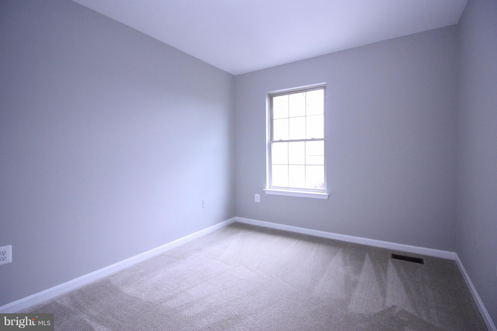 2218 Bear Den Road Frederick, MD 21701 - Photo 17 of 30 an empty room with a window