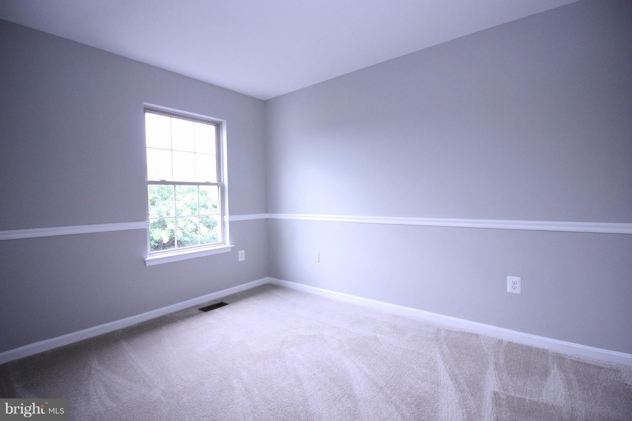2218 Bear Den Road Frederick, MD 21701 - Photo 18 of 30 an empty room with a window