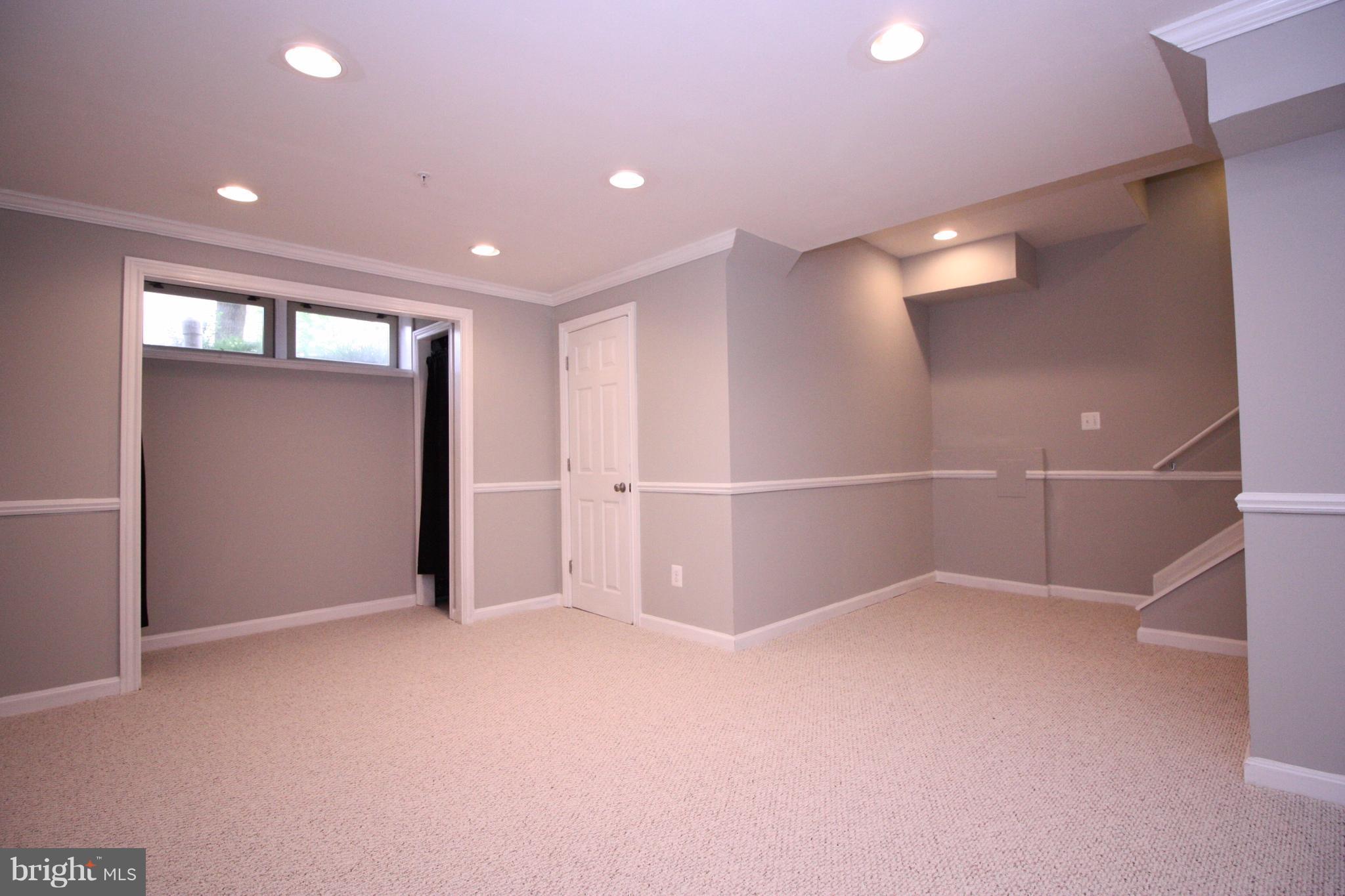 2218 Bear Den Road Frederick, MD 21701 - Photo 21 of 30 an empty room with closet and windows