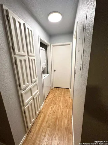 a view of wooden floor in an empty room
