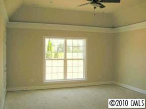 3325 Williams Road Matthews, NC 28105 - Photo 5 of 8 a view of an empty room and a window