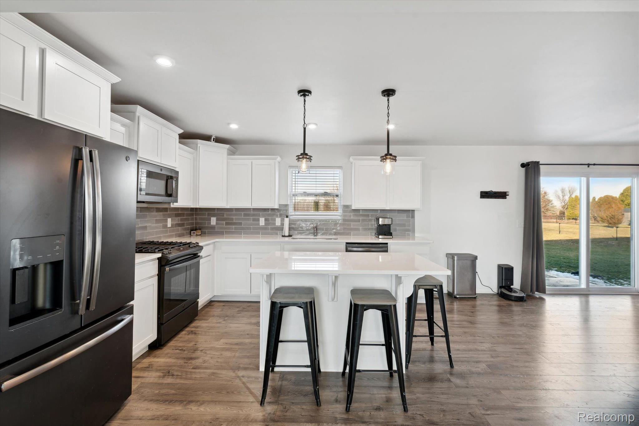 8024 Jordan Drive Jackson, MI 49201 - Photo 11 of 39 Large Island with seating