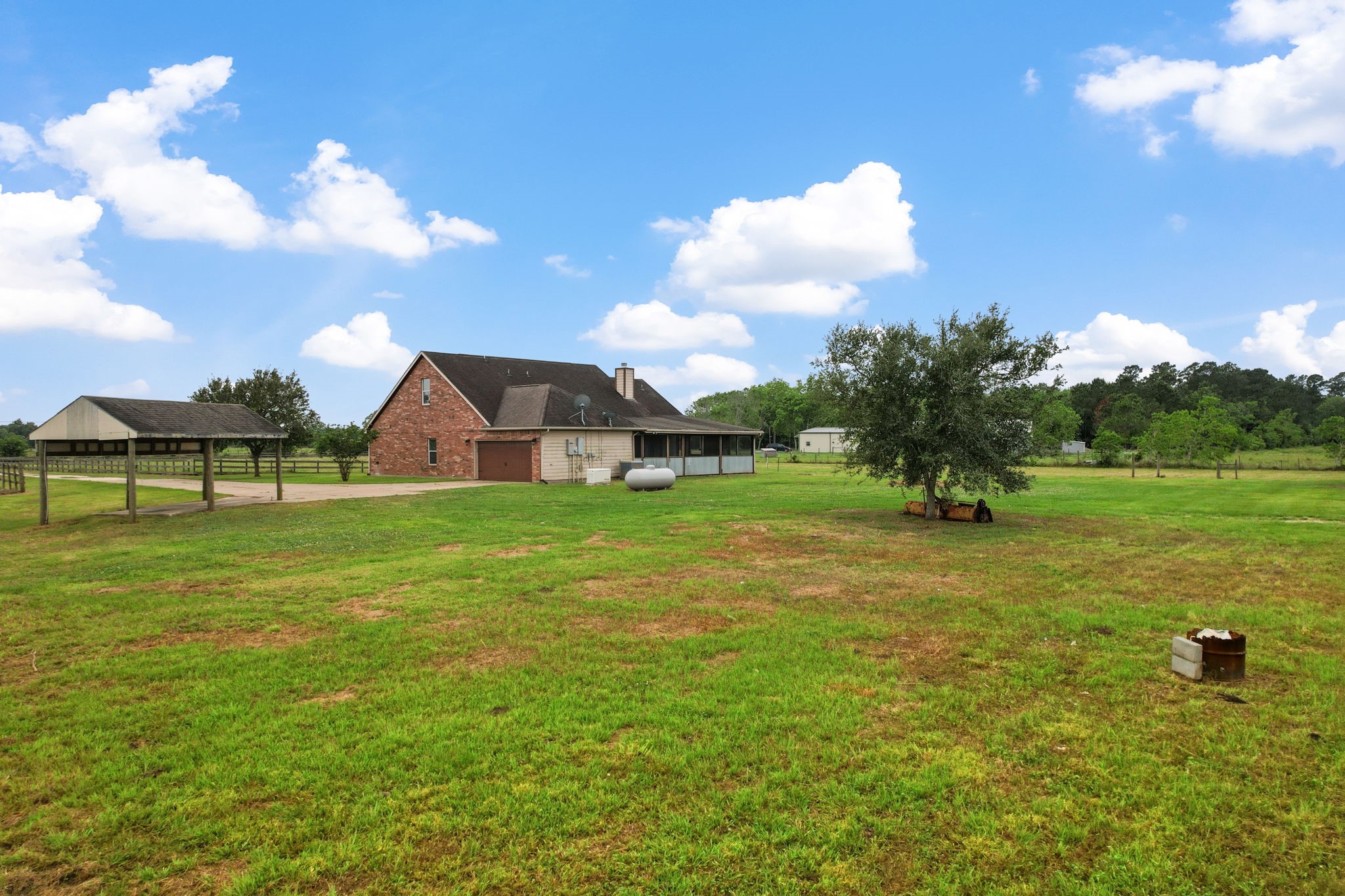 1405 Big Hill Road Winnie, TX 77665 - Photo 10 of 43 a view of a house with a yard
