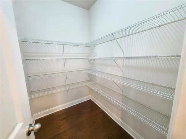 a empty closet with white paint