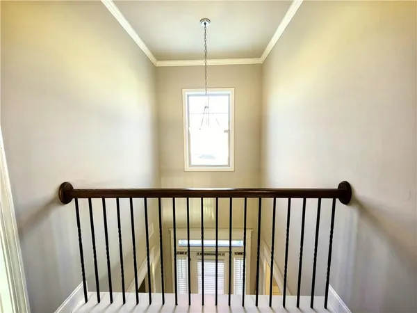 a view of entryway with wooden floor