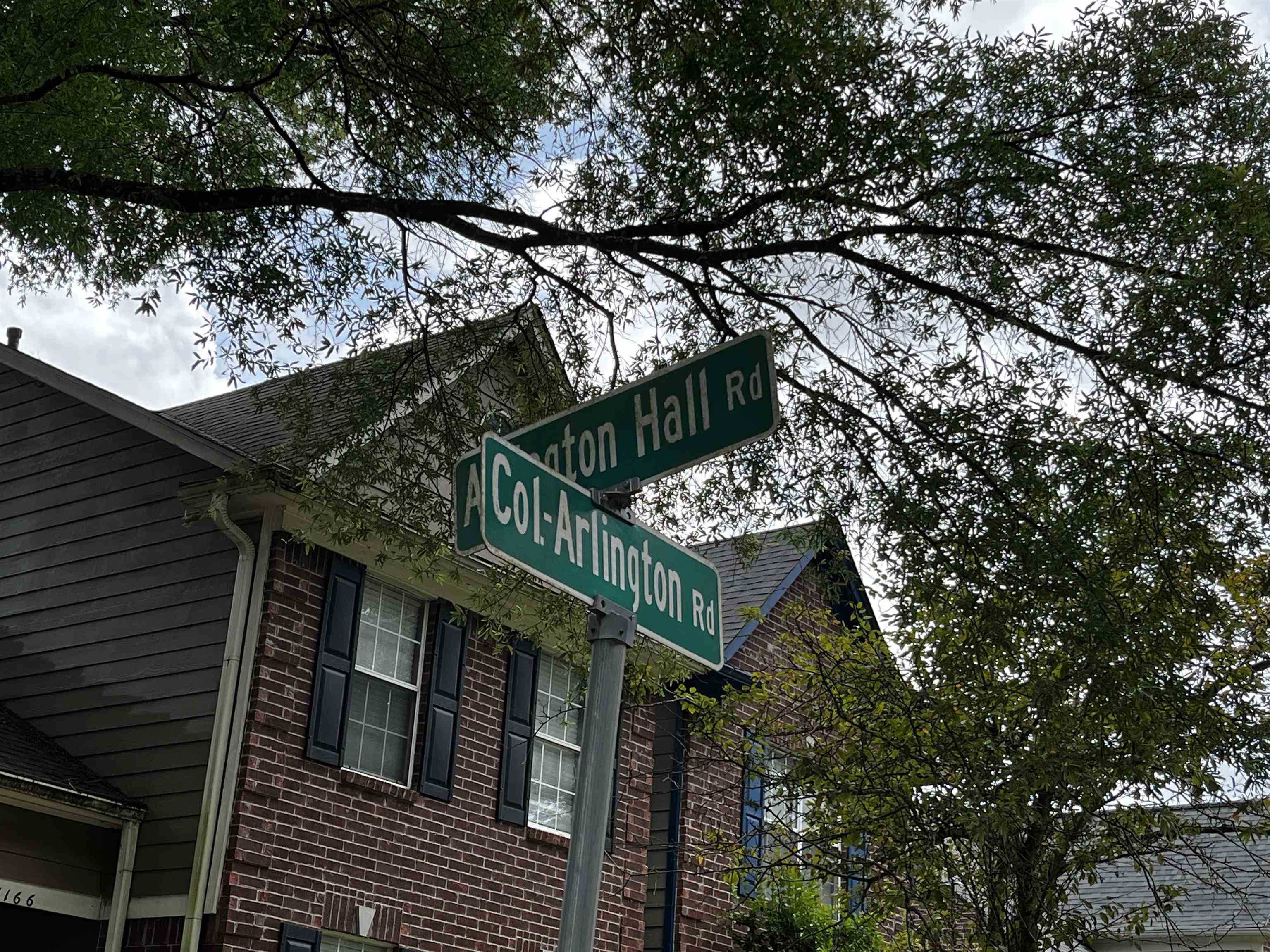 1182 Collierville Arlington Road Collierville, TN 38017 - Photo 29 of 34 a street sign on a pole