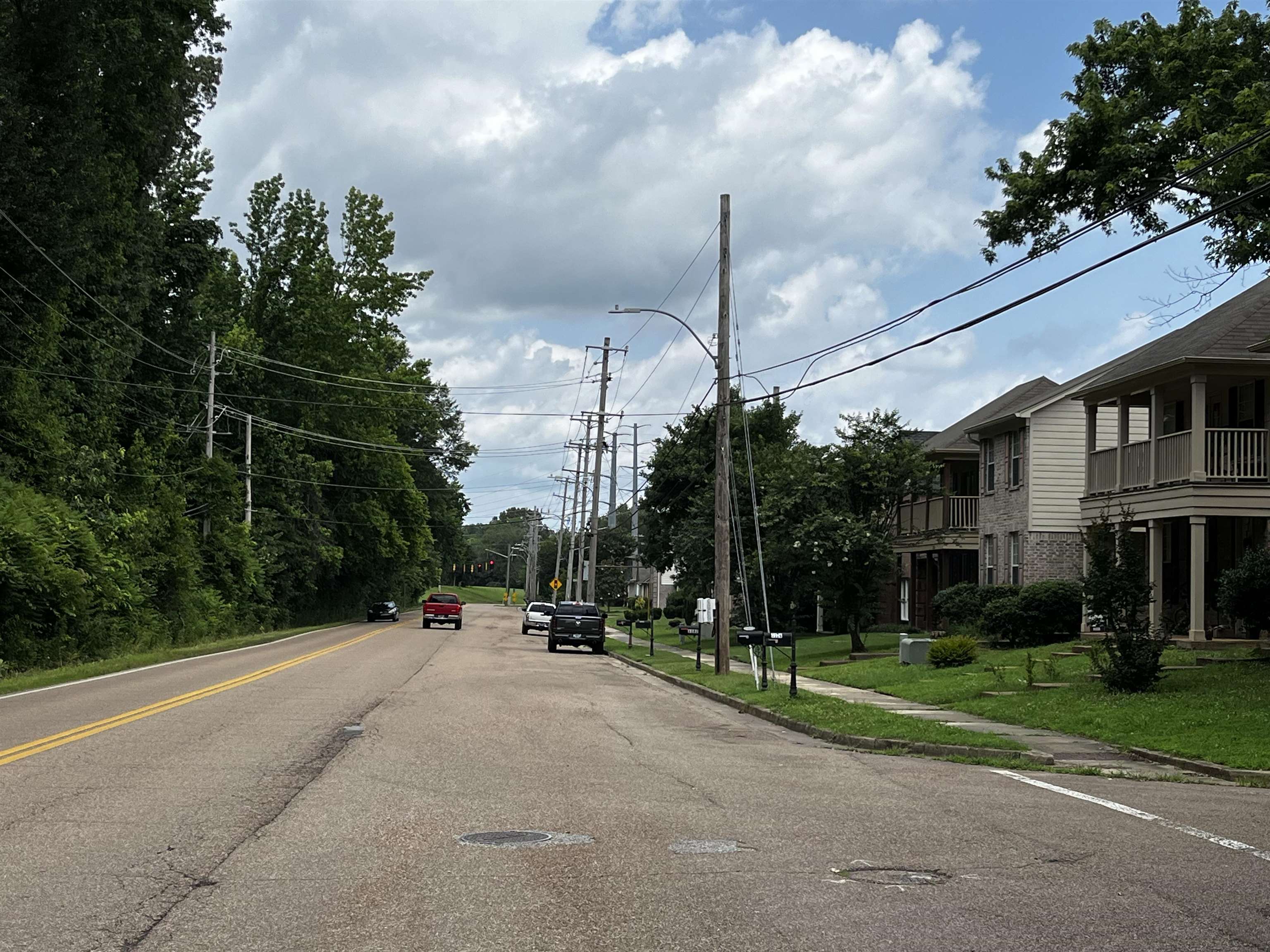 1182 Collierville Arlington Road Collierville, TN 38017 - Photo 30 of 34 a view of a street with a building in the background