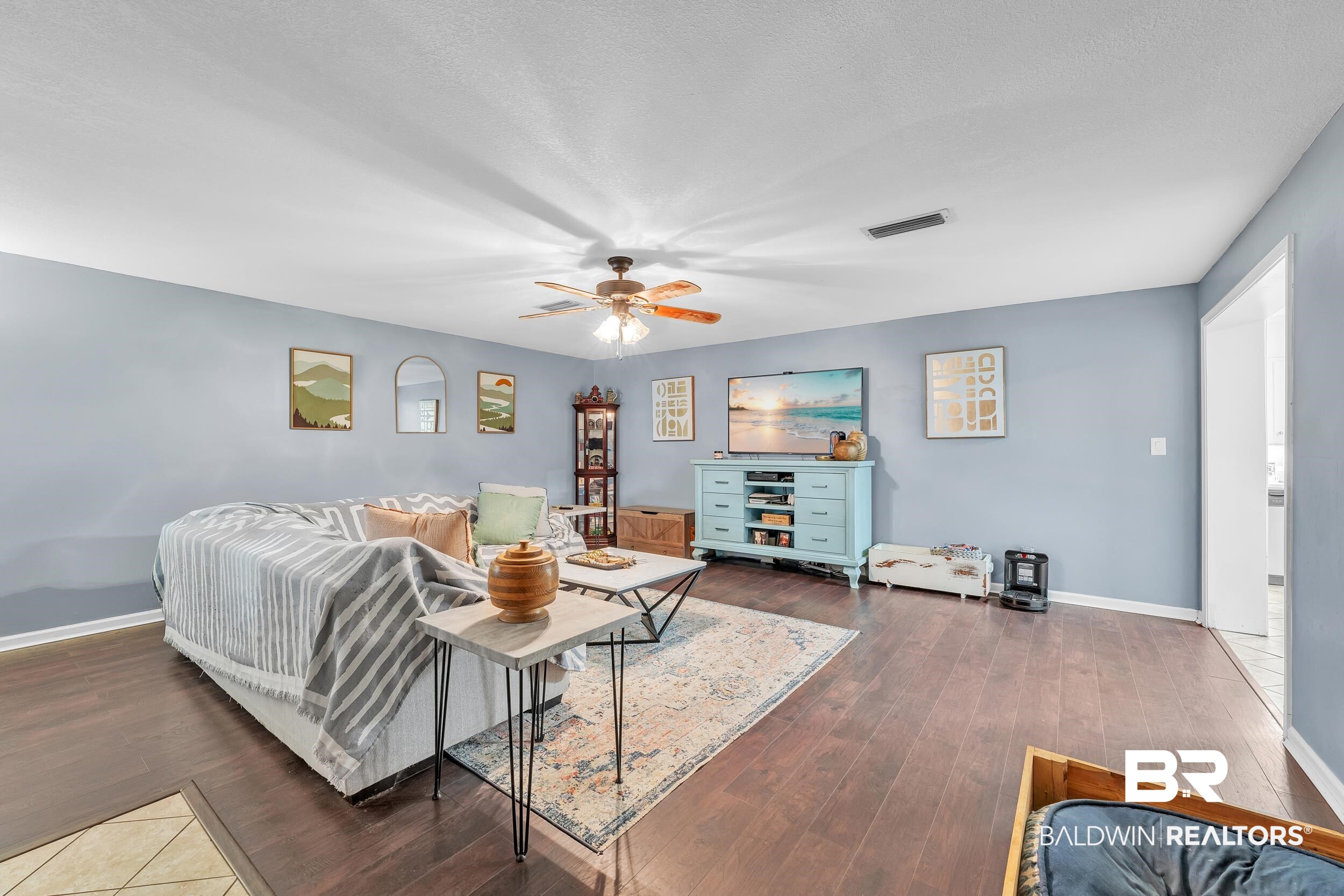 206 West Jackson Avenue Summerdale, AL 36580 - Photo 10 of 37 Living room featuring ceiling fan, wood finished floors, and baseboards
