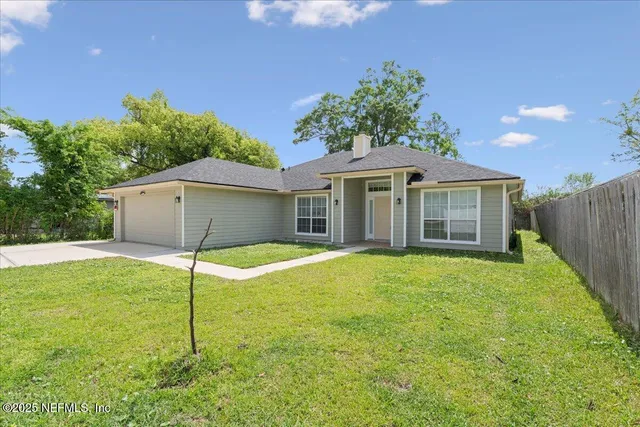 a house view with a garden space
